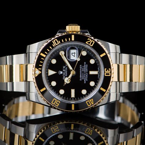 rolex submariner two tone gold.